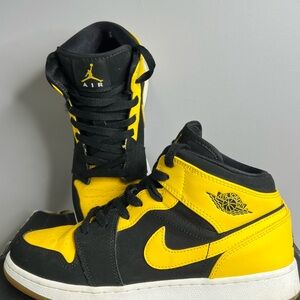 Nike Air Jordan Mid Sneakers in black and yellow